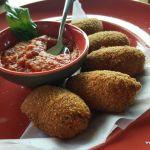 Chicken croquets stuffed with dark olive