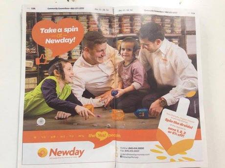 the new Jewish family spins the dreidel in the supermarket