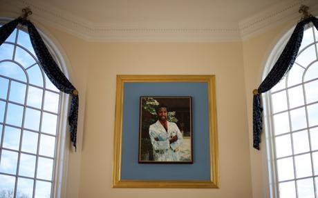 Painting of Carson over the fireplace in main lounge area