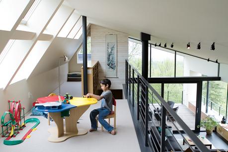 The loft above the living room in the Leiniche Navitsky residence featuring clerestory windows.