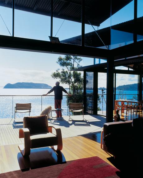 Dougal James-Robertson explains that with all the glass doors open, the couple is “fully in touch with whatever’s happening naturally.” Contrary to what the image here portrays, this is not always a good thing, as the weather can pack a wallop with intens