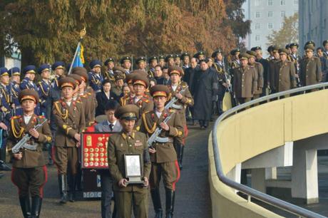 Kim Jong Un leads the state funeral committee out of the Central Hall of Workers in Pyongyang on November 11, 2015, as they process behind the casket of MAR Ri Ul Sol and members of Ri's family (Photo: Rodong Sinmun).
