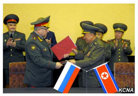 Russian Federation Armed Forces 1st Vice Chief of the General Staff Col. Gen. Nikolai Bogdanovski (left) exchanges an agreement with Vice Chief of the KPA General Staff Col. Gen. O Kum Chol (right) in Pyongyang on November 12, 2015 (Photo: KCNA).