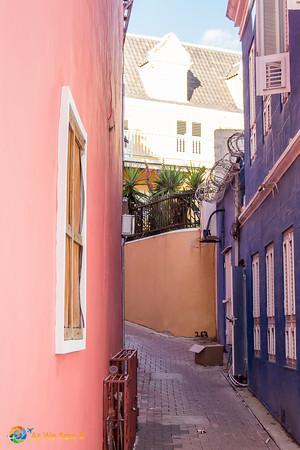 Quiet alley in downtown Willemstad reveals the vibrant colors extend off of the main streets in Curacao.