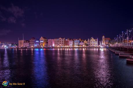 The Queen Emma bridge in place as the sun has given way to the moon over Willemstad, Curacao.