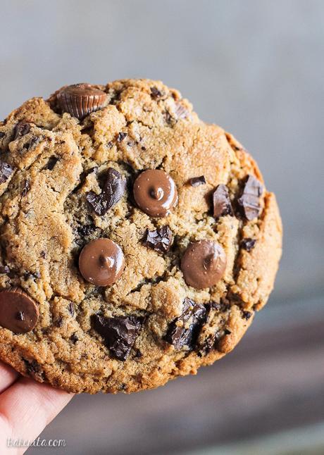 These Giant Peanut Butter Cup Chocolate Chunk Cookies are big, chewy, and full of peanut butter, peanut butter cups, and rich melted chocolate! If you love chocolate and peanut butter, these cookies will become a quick favorite.