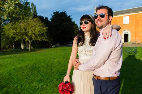 Bride and groom portraits with low summer sun Bride & groom under willow tree Langar Hall Wedding Photography wearing sunglasses