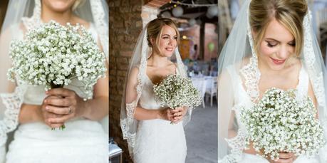 Bride holding gypsophelia bouquet Barmbyfield Barn Wedding