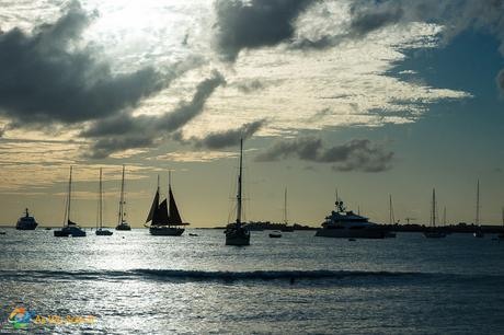 Silhouetted boats on the Caribbean Sea in St. Maarten.