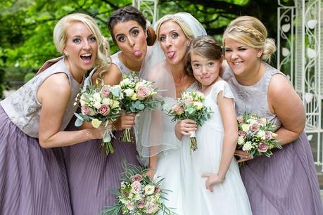 Bride & bridesmaid make silly faces at crow hill wedding