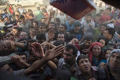 Syrian refugees (Photo credit: Lynsey Addario/NYT) 