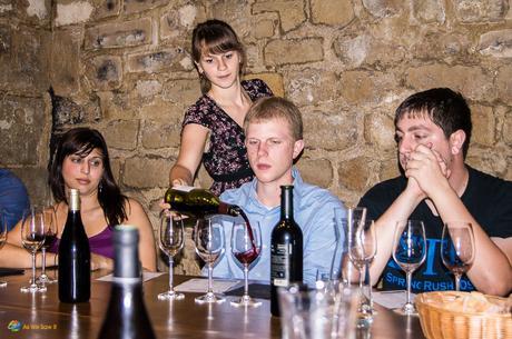 Serving wine in a French chateau