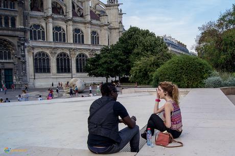 Two people sitting together in Paris