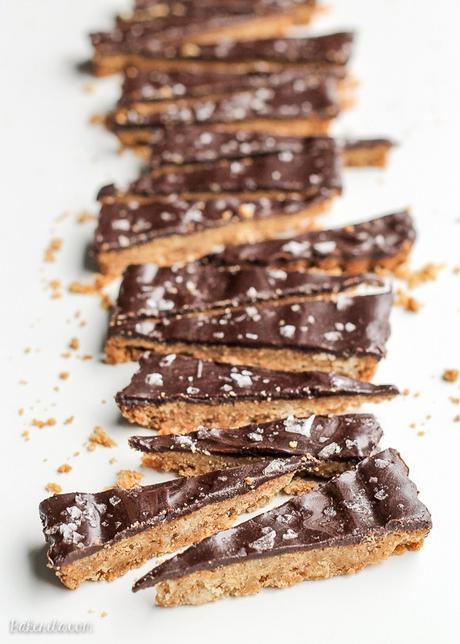 These Brown Butter Shortbread with Dark Chocolate + Sea Salt are full of simple, good quality ingredients for a sandy shortbread cookie that's the perfect addition to any holiday party. Dark chocolate and a sprinkle of good sea salt make this shortbread even more irresistible!