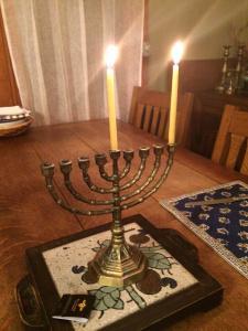 To My Interfaith College Kids: Hanukkah Giving First Night of Hanukkah, photo by Susan Katz Miller