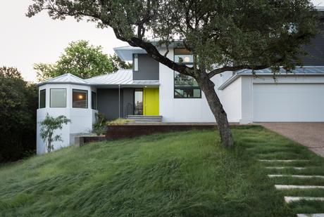 JamesHardie Smooth Lap siding in Benjamin Moore’s “Iron Mountain” in Texas renovation by Arbib Hughey Design.
