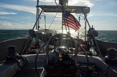 american flag sailboat ocean