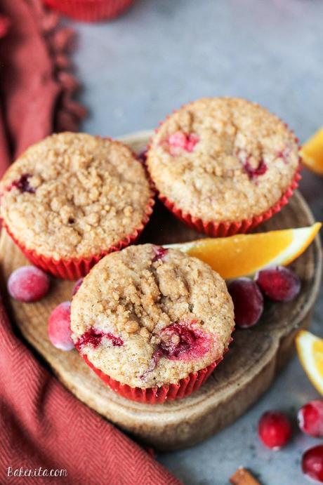 These Cranberry Orange Muffins are bursting with tart cranberries + orange zest and topped with a sweet crumble - you'd never guess that they're vegan!