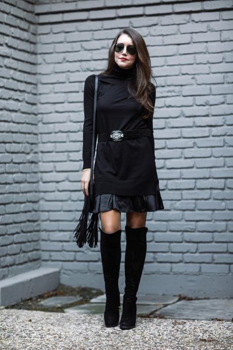 Amy Havins wears a black sweater dress from Polo Ralph Lauren.
