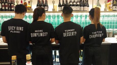 Staff wearing their quirky t-shirts