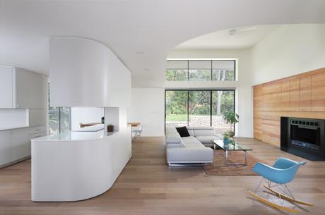 white-washed oak floors and clear-coated pine accent wall in Texas renovation by Arbib Hughey Design.