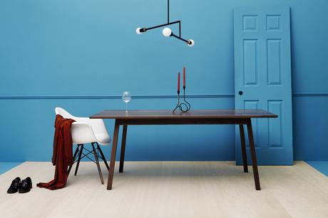 Solid walnut dining table by Brush Factory