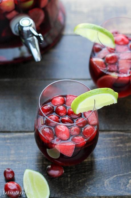 This Cranberry Lime Sangria is a sparkling + festive take on sangria! This is the perfect refreshing cocktail for a crowd.