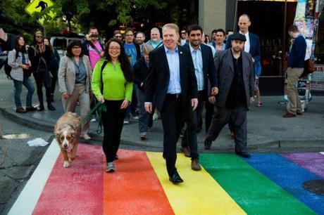 Mayor Ed Murray proudly walks a crime-fighting rainbow sidewalk. KIRO TV photo