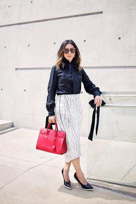 alexander mcqueen bow blouse, balenciaga cracked paint skirt, celine black and white pumps, saint laurent sac de jour in red, how to wear a white skirt pussybow blouse