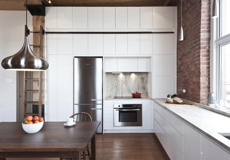 Kitchen of 850 square-foot Montreal apartment renovation by Gepetto. 