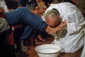 Pope Francis kneels1