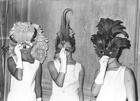 Black & White Photo Of Three Women Going To A Masquerade Ball