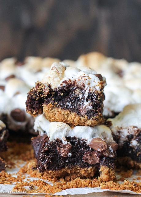 These S'mores Brownies are super fudgy chocolate brownies swirled with marshmallow fluff and milk chocolate chips, baked on a graham cracker crust and topped with toasted mini marshmallows.