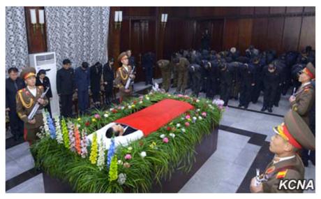 A KPA honor guard stand in attendance at the funeral parlor of WPK Secretary Kim Yang Gon in Pyongyang on December 30, 2015. Also in attendance are members of Kim's family (left) (Photo: KCNA).