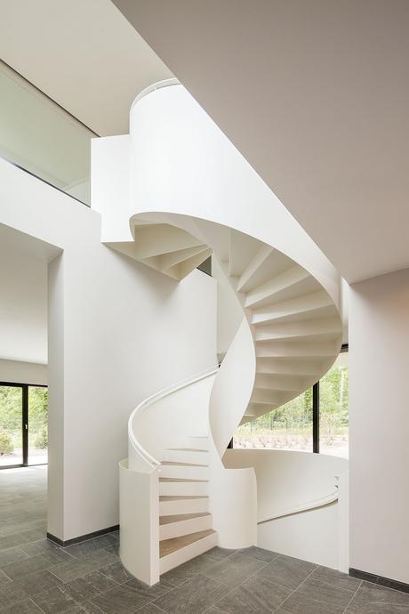 Bold white spiral staircase