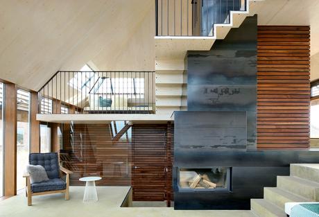 Fireplace and stairs in the Netherlands dune house