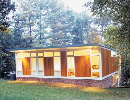 Originally constructed in 1970, the Wilson residence was updated by the architect couple in 2004. They expanded the home by about a third, but the original design of the rear elevation (seen here at dusk) was largely maintained.