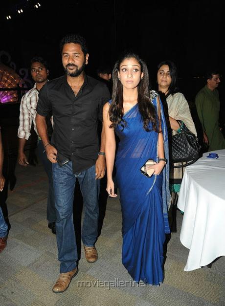   Nayanthara wearing Blue color Georgette saree with stone brooch over the shoulder