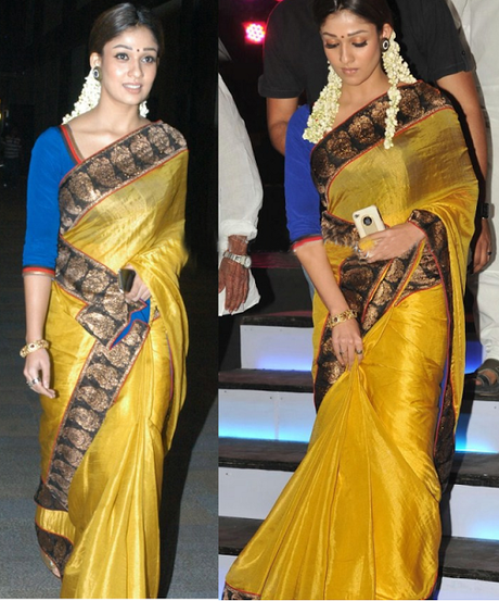  Nayanthara wearing yellow color silk saree with contrast blue color three fourth sleeves