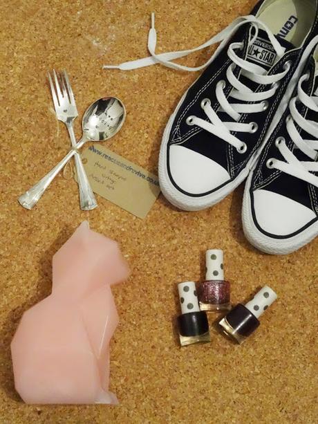 love pudding spoon, pair of converse, three Topshop Nail varnish and a Cat candle