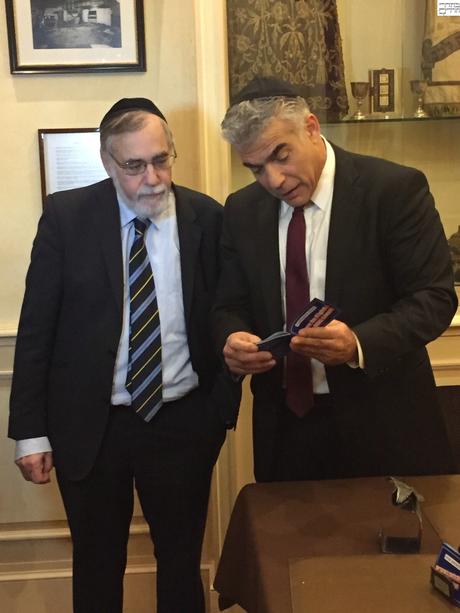 Lapid wears a kippa and tells people not to be afraid