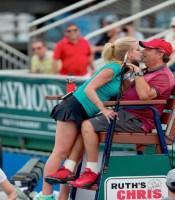 Haha! Looks like Maeve Quinlan is trying to sway chair ump Lovitz!