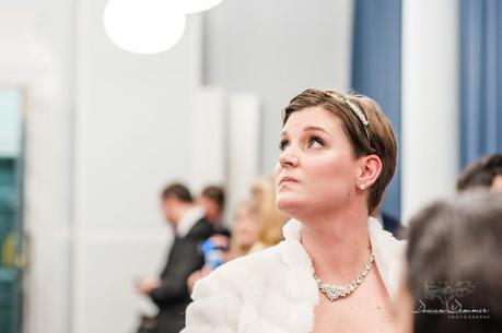 Bride holds back tears at Mayfair library