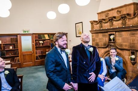 Same Sex couple enjoy joke during ceremony in Best of Wedding Photography 2015