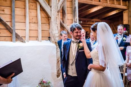 Bride shares a moment wth the groom during ceremony