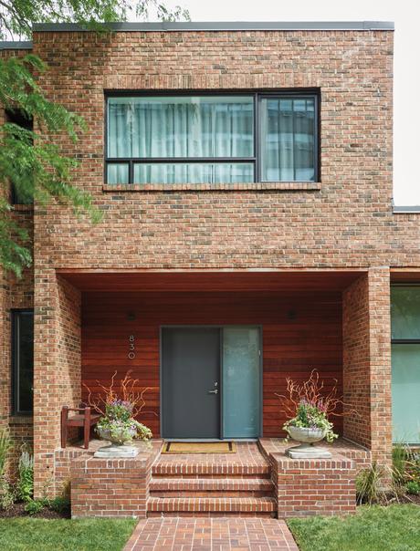 Ipe and brick exterior of Chicago renovation by dSPACE Studio.