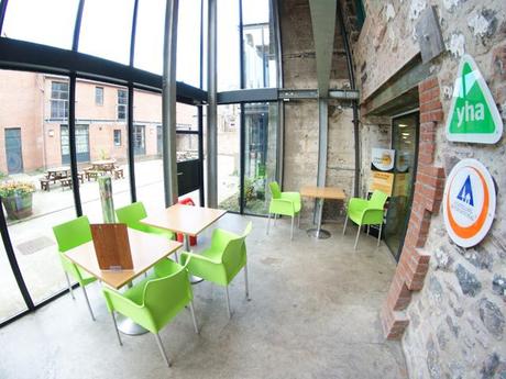 YHA Berwick - Glass-fronted area looking out into courtyard