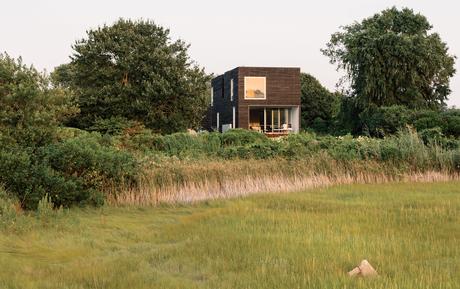 Charred, brushed, and oiled cypress facade of Rhode Island family vacation home by Bernheimer Architecture.