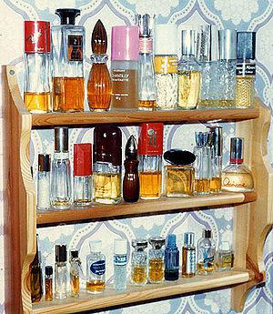 Shelves of perfumes: a closed cabinet, to keep...
