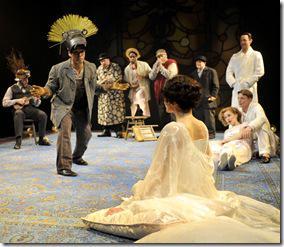 Snug (Richard Manera) performs the role of a lion in a play with his fellow mechanicals, while members of the court look on, in CST Associate Artistic Director Gary Griffin's production of William Shakespeare's A Midsummer Night's Dream, now playing at Chicago Shakespeare Theater. (photo credit: Liz Lauren)